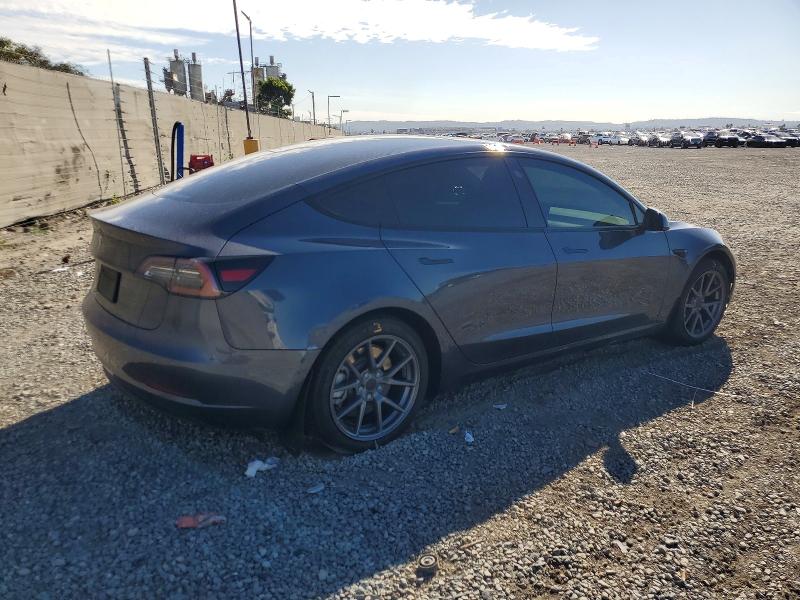 Photo 3 from auction – 2022 TESLA MODEL 3 with VIN 5YJ3E1EA3NF122852
