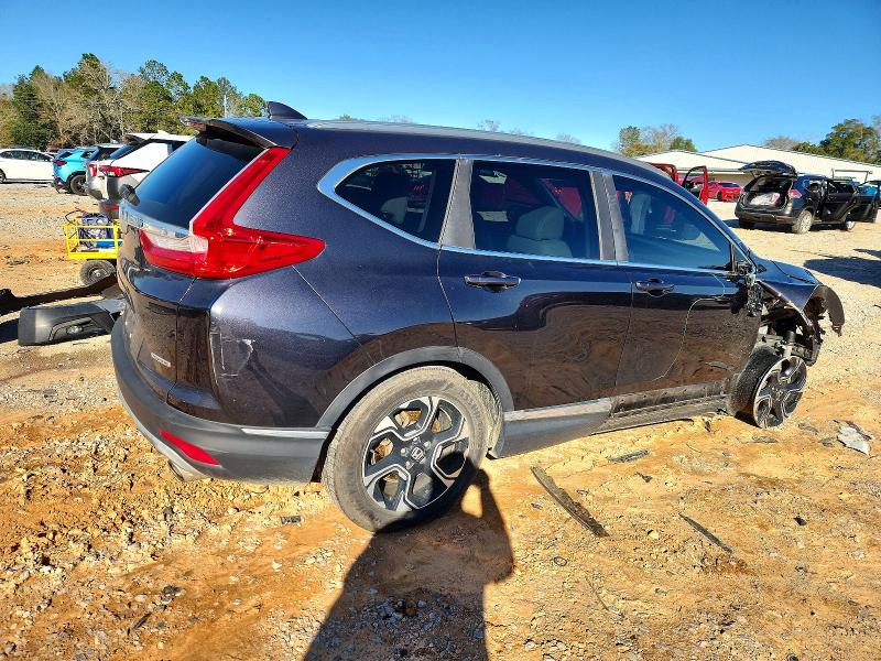 Photo 3 from auction – 2018 HONDA CR-V with VIN 7FARW1H98JE008711