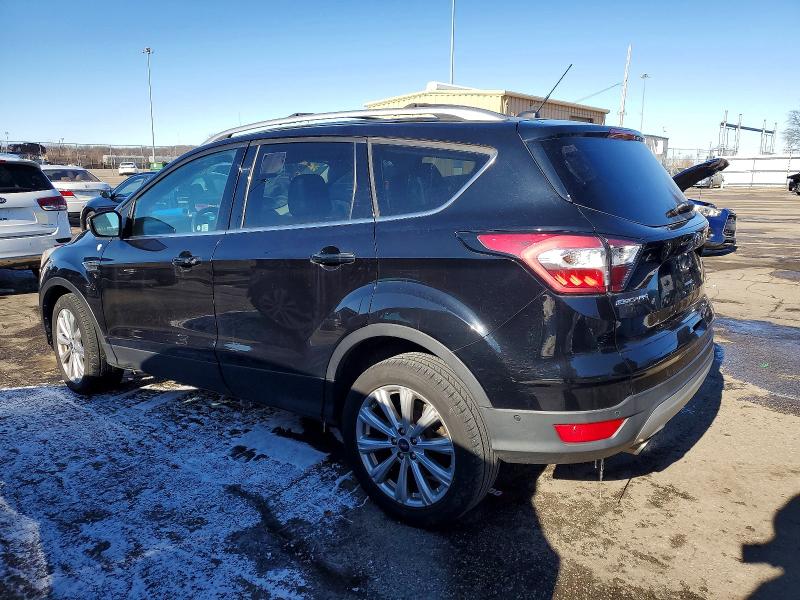 Photo 2 from auction – 2017 FORD ESCAPE TIT with VIN 1FMCU9J92HUC69927