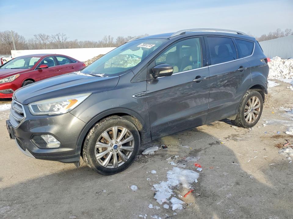 FORD ESCAPE 2017 with VIN 1FMCU0JD5HUD18599 - Photo from auction