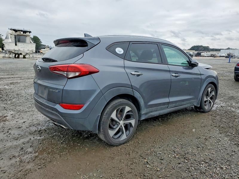 Photo 3 from auction – 2016 HYUNDAI TUCSON with VIN KM8J33A21GU024108
