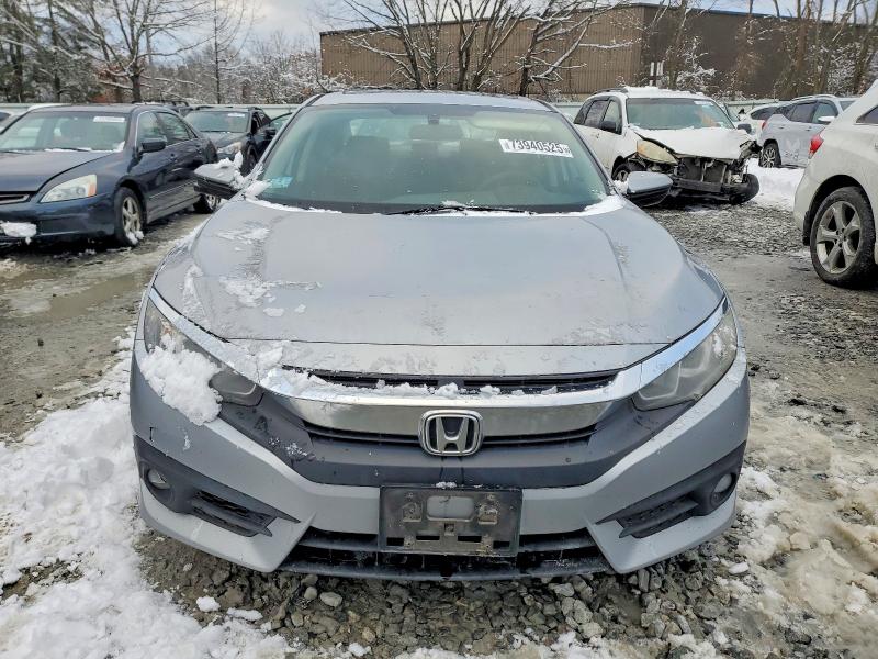 Photo 5 from auction – 2017 HONDA CIVIC EX with VIN 19XFC1F36HE208623