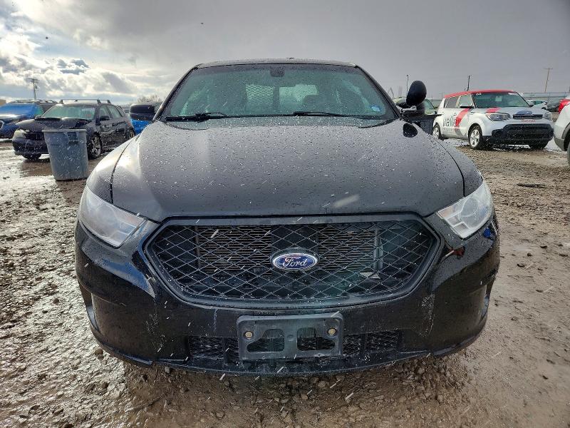 Photo 5 from auction – 2014 FORD TAURUS POL with VIN 1FAHP2MKXEG166617