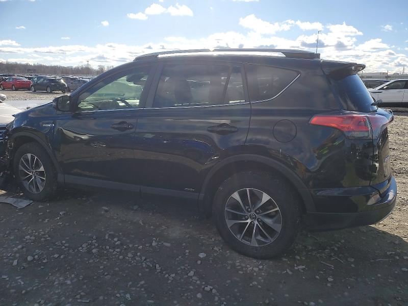 Photo 2 from auction – 2018 TOYOTA RAV4 HV LE with VIN JTMRJREV3JD171476