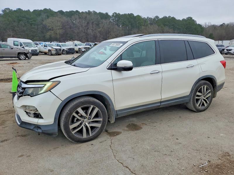 Photo 1 from auction – 2016 HONDA PILOT TOUR with VIN 5FNYF5H93GB019090