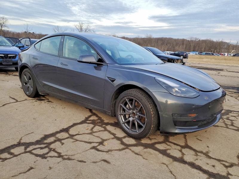 Photo 4 from auction – 2023 TESLA MODEL 3 with VIN 5YJ3E1EA5PF663212