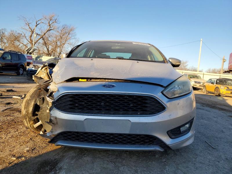 Photo 5 from auction – 2015 FORD FOCUS SE with VIN 1FADP3F28FL293781