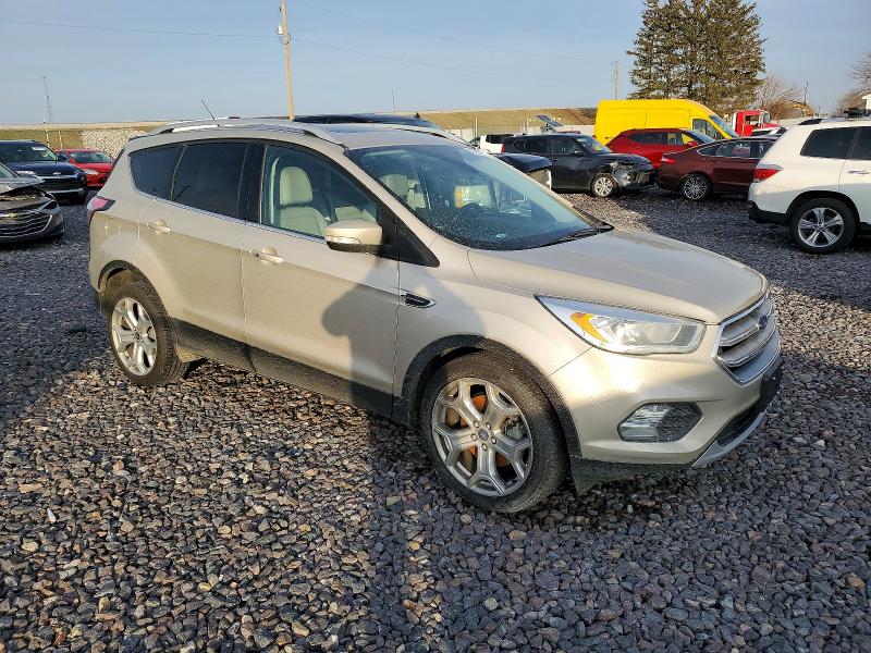 Photo 4 from auction – 2017 FORD ESCAPE with VIN 1FMCU0J94HUC13502
