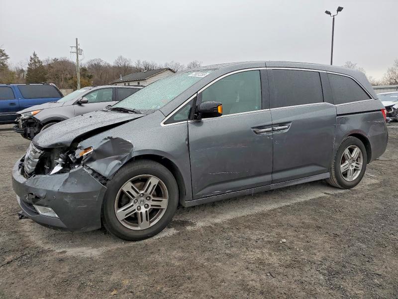 HONDA ODYSSEY 2011 with VIN 5FNRL5H92BB027347 - Photo from auction