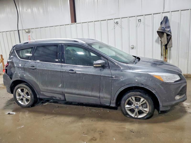 Photo 4 from auction – 2016 FORD ESCAPE TIT with VIN 1FMCU9JX1GUB12743