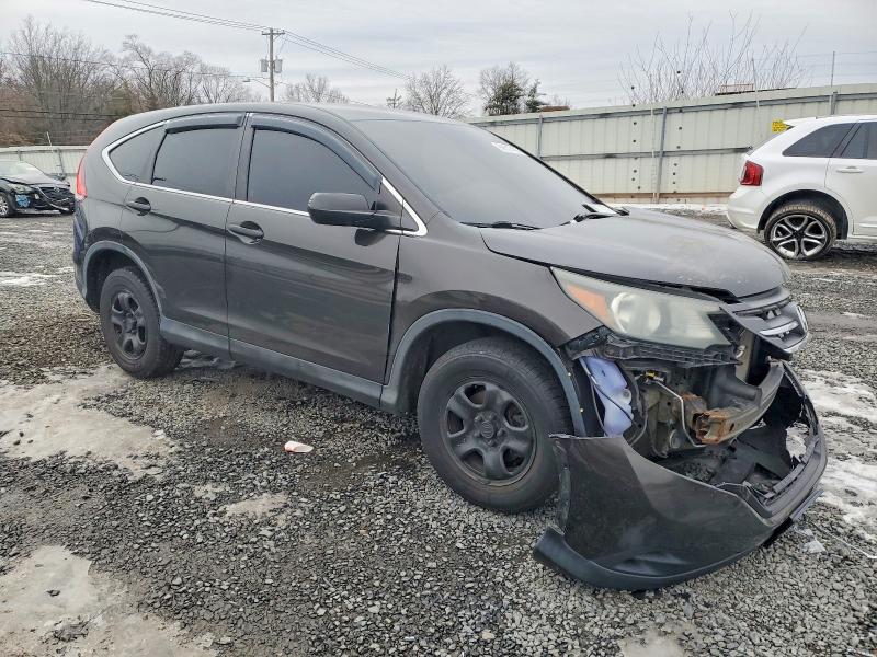 Photo 4 from auction – 2014 HONDA CR-V LX with VIN 5J6RM4H32EL032191