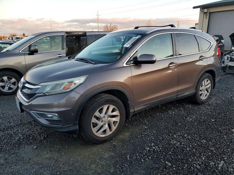 Photo 1 from auction – 2015 HONDA CR-V EXL with VIN 2HKRM4H74FH610080