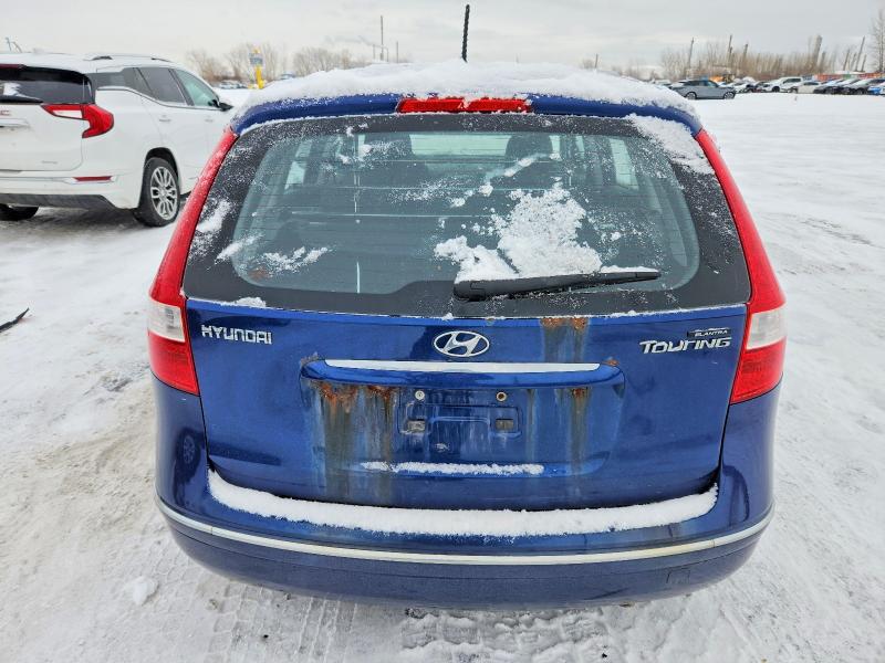 Photo 6 from auction – 2011 HYUNDAI ELANTRA TOURING with VIN KMHDB8AEXBU112350