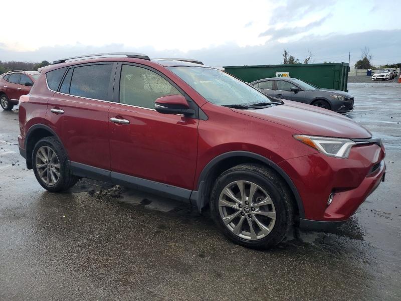 Photo 4 from auction – 2018 TOYOTA RAV4 LIMIT with VIN JTMDFREV5JD245248