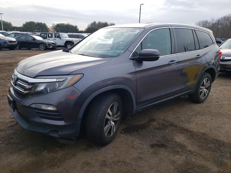 HONDA PILOT EXL 2018 with VIN 5FNYF6H56JB007994 - Photo from auction