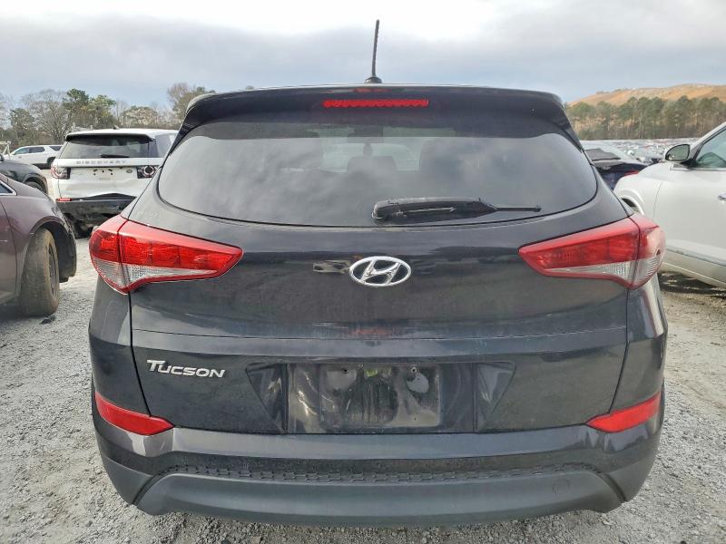 Photo 6 from auction – 2016 HYUNDAI TUCSON SE with VIN KM8J23A45GU197716