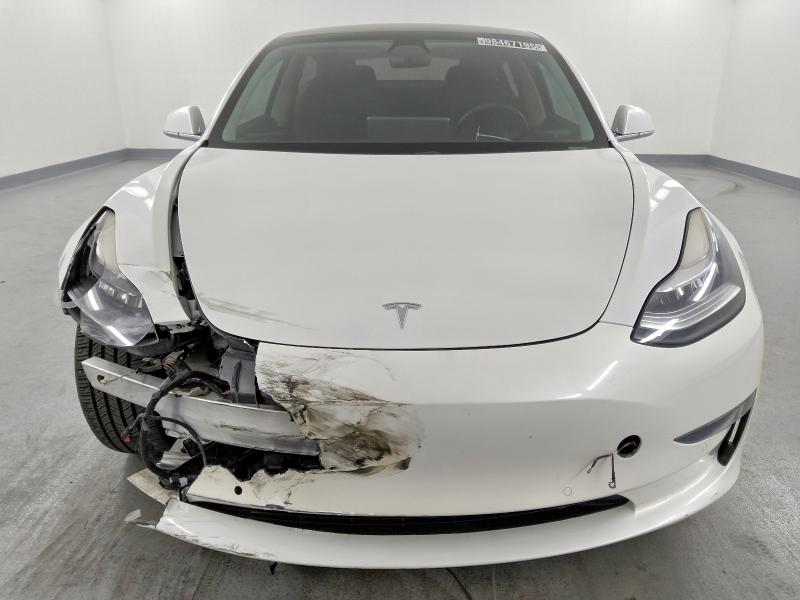 Photo 5 from auction – 2020 TESLA MODEL 3 with VIN 5YJ3E1EA1LF660107