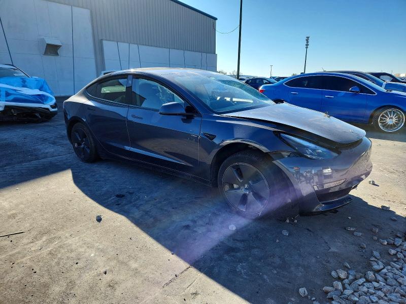 Photo 4 from auction – 2023 TESLA MODEL 3 with VIN 5YJ3E1EA6PF448020