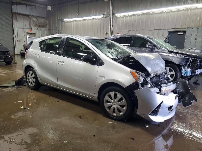 Photo 4 from auction – 2014 TOYOTA PRIUS C with VIN JTDKDTB32E1570878