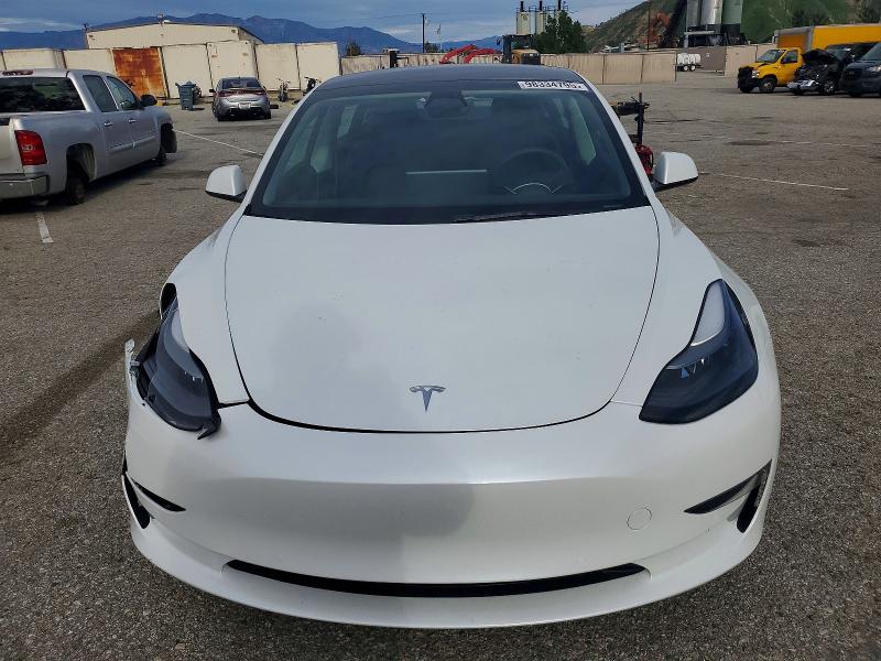 Photo 5 from auction – 2022 TESLA MODEL 3 with VIN 5YJ3E1EA9NF320075