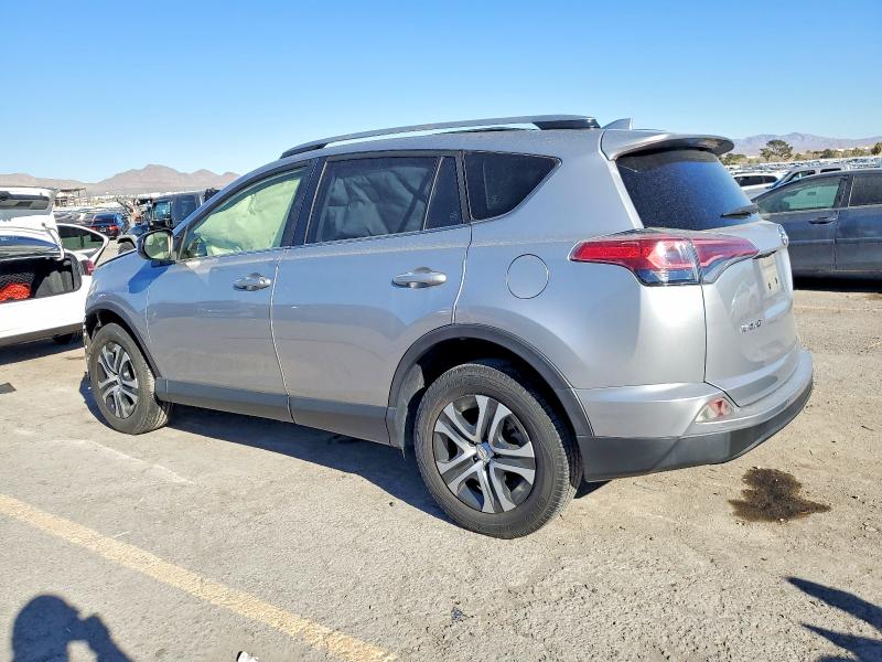 Photo 2 from auction – 2018 TOYOTA RAV4 LE with VIN JTMZFREV7JD131614