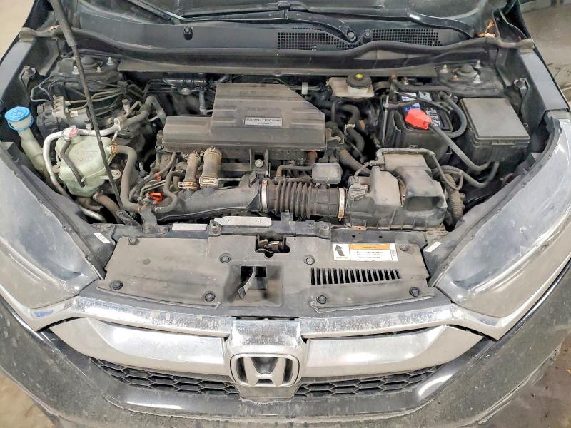 Photo 12 from auction – 2018 HONDA CR-V with VIN 7FARW2H55JE015957