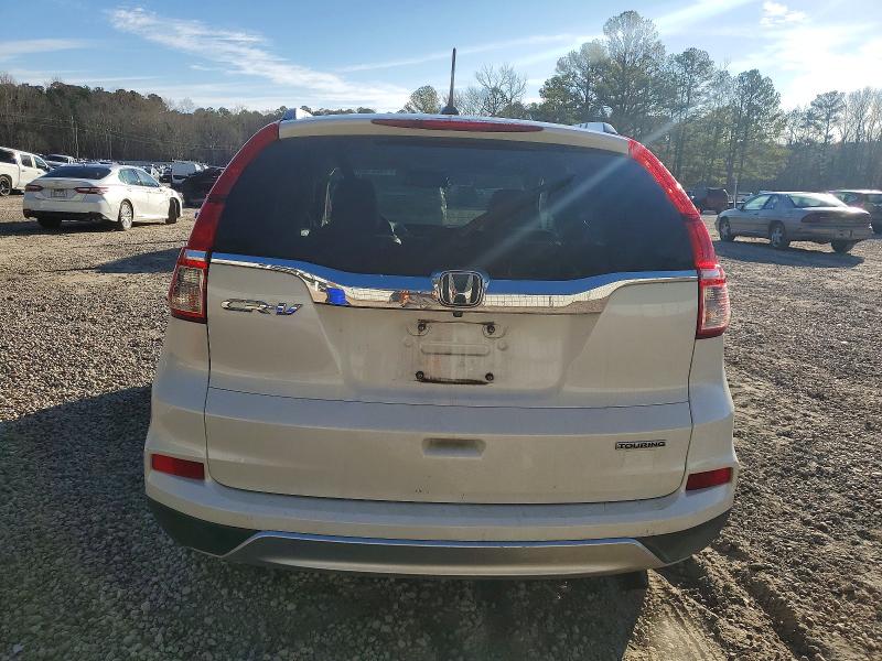 Photo 6 from auction – 2016 HONDA CR-V TOURI with VIN 5J6RM3H91GL025783