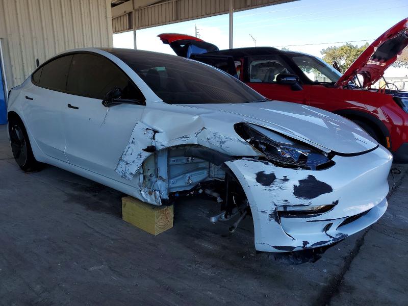 Photo 4 from auction – 2023 TESLA MODEL 3 with VIN 5YJ3E1EA6PF419178