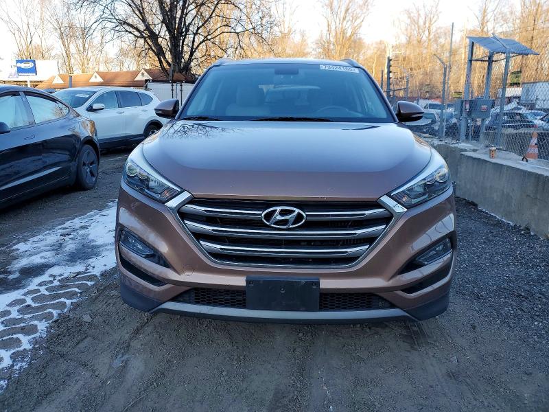 Photo 5 from auction – 2016 HYUNDAI TUCSON LIM with VIN KM8J3CA25GU051330