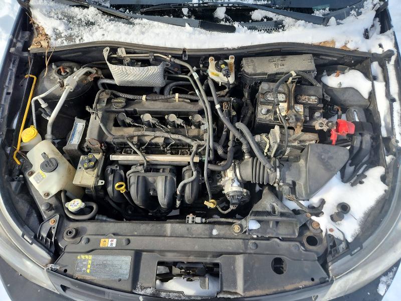 Photo 11 from auction – 2009 FORD FOCUS with VIN 1FAHP33N59W146997