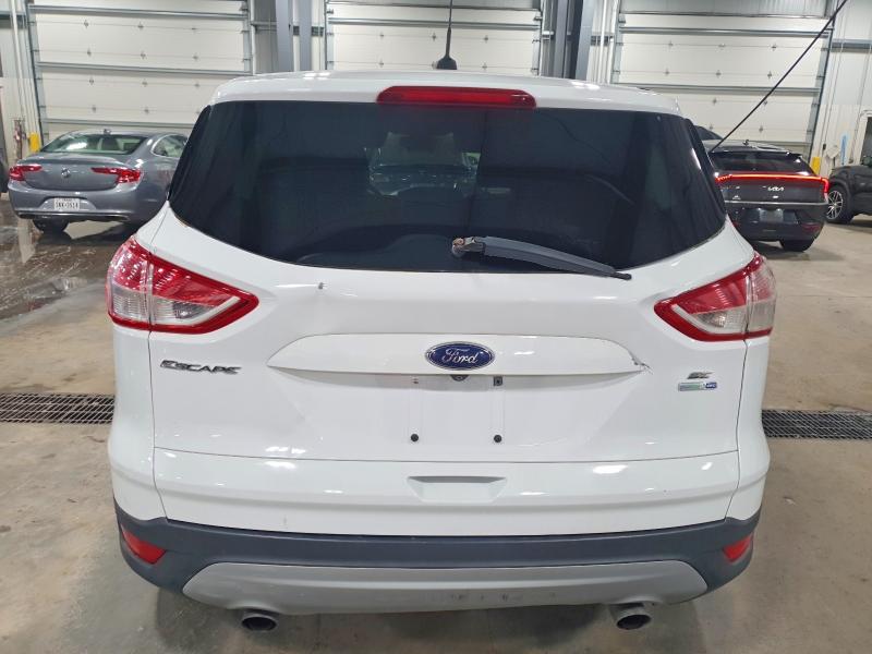 Photo 6 from auction – 2016 FORD ESCAPE SE with VIN 1FMCU9GX3GUC81685