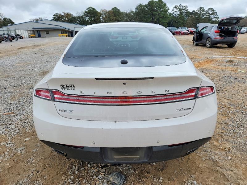 Photo 6 from auction – 2014 LINCOLN MKZ with VIN 3LN6L2G91ER829261