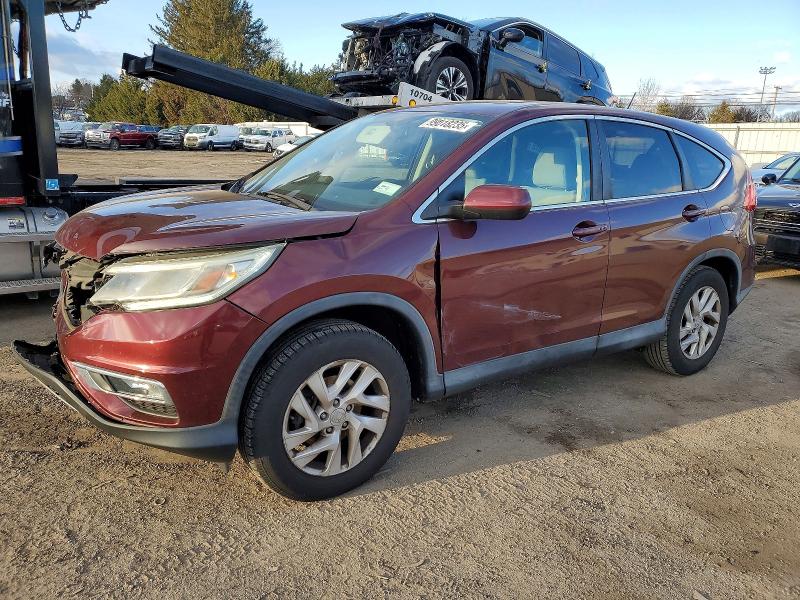 Photo 1 from auction – 2015 HONDA CR-V with VIN 2HKRM4H57FH605440