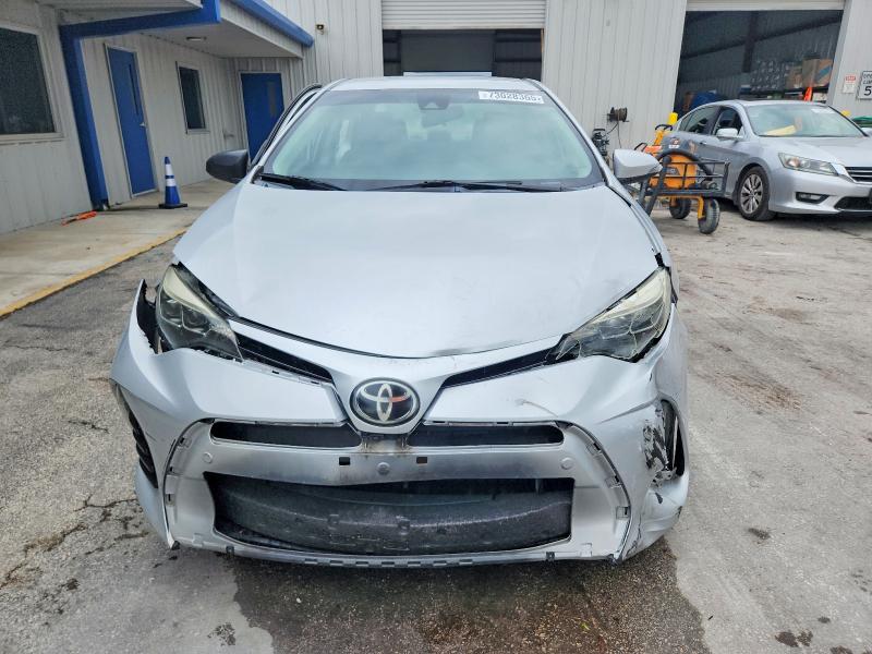 Photo 5 from auction – 2017 TOYOTA COROLLA with VIN 5YFBURHE5HP653443