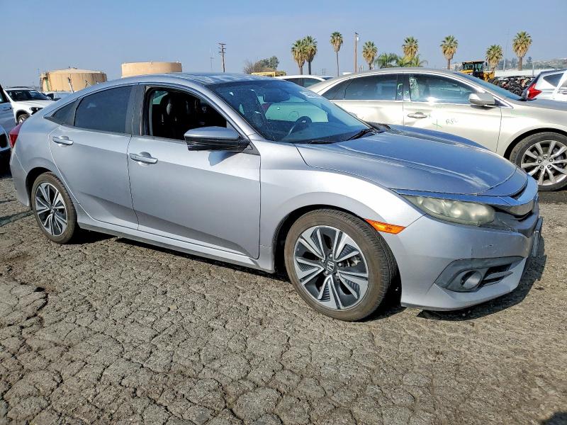 Photo 4 from auction – 2016 HONDA CIVIC EXL with VIN 2HGFC1F73GH647401