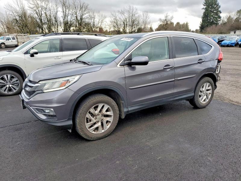 HONDA CR-V 2015 with VIN 2HKRM4H74FH613271 - Photo from auction