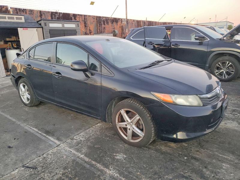 Photo 4 from auction – 2012 HONDA CIVIC LX with VIN 19XFB2F54CE345983