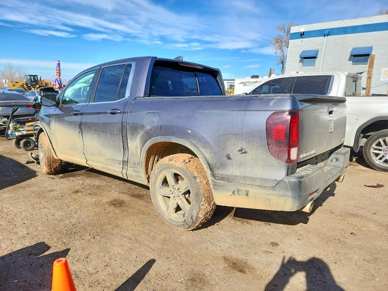 Photo 2 from auction – 2022 HONDA RIDGELINE with VIN 5FPYK3F59NB033273