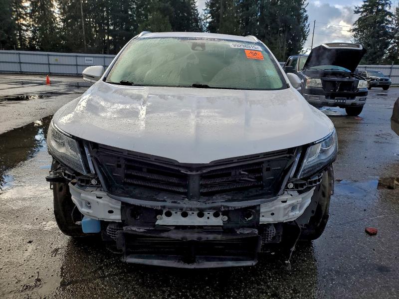 Photo 5 from auction – 2015 LINCOLN MKC with VIN 5LMCJ2A92FUJ26860