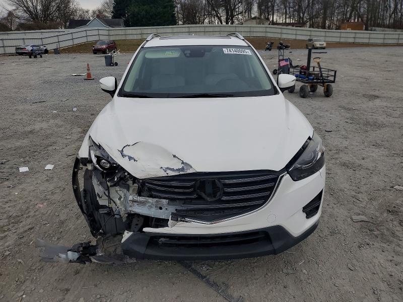 Photo 5 from auction – 2016 MAZDA CX-5 with VIN JM3KE2DYXG0864416