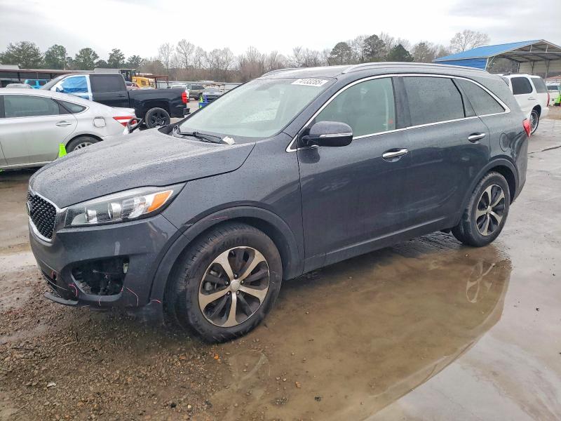 KIA SORENTO EX 2016 with VIN 5XYPH4A55GG093725 - Photo from auction