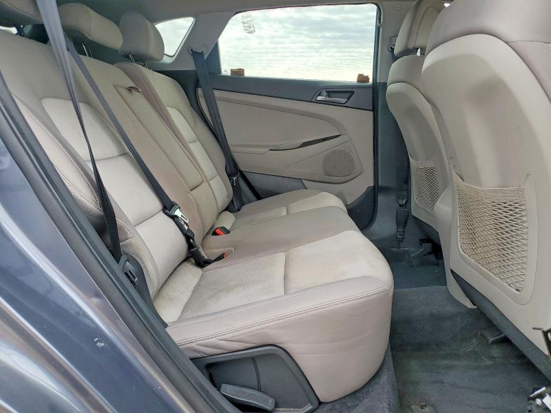 Photo 11 from auction – 2016 HYUNDAI TUCSON SE with VIN KM8J23A45GU226549