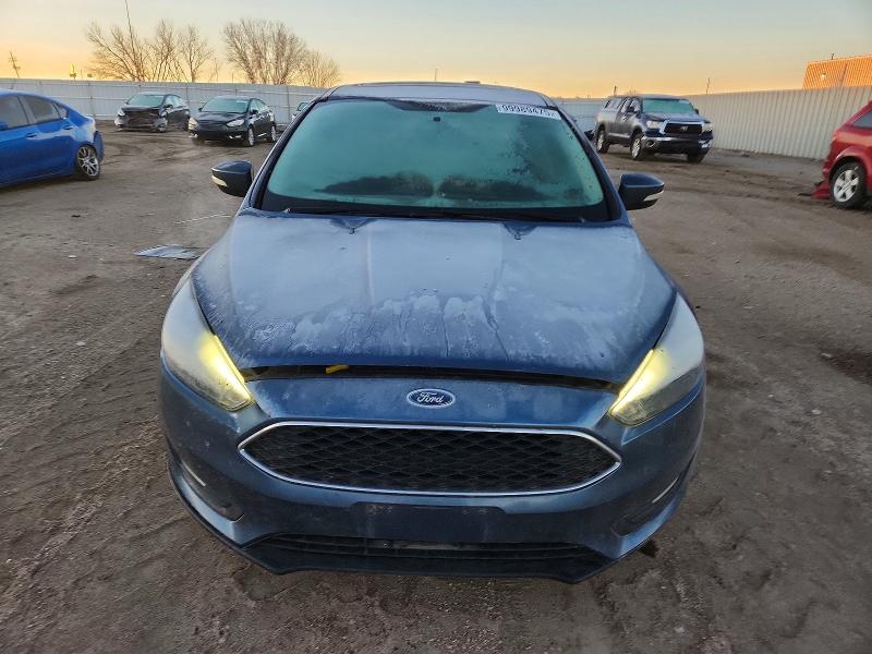 Photo 5 from auction – 2018 FORD FOCUS with VIN 1FADP3H23JL293001
