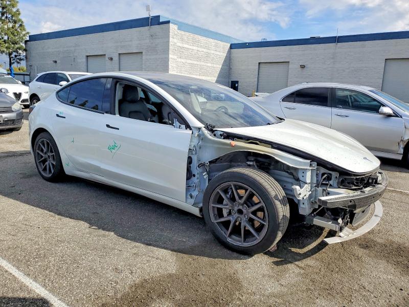 Photo 4 from auction – 2021 TESLA MODEL 3 with VIN 5YJ3E1EA2MF053120