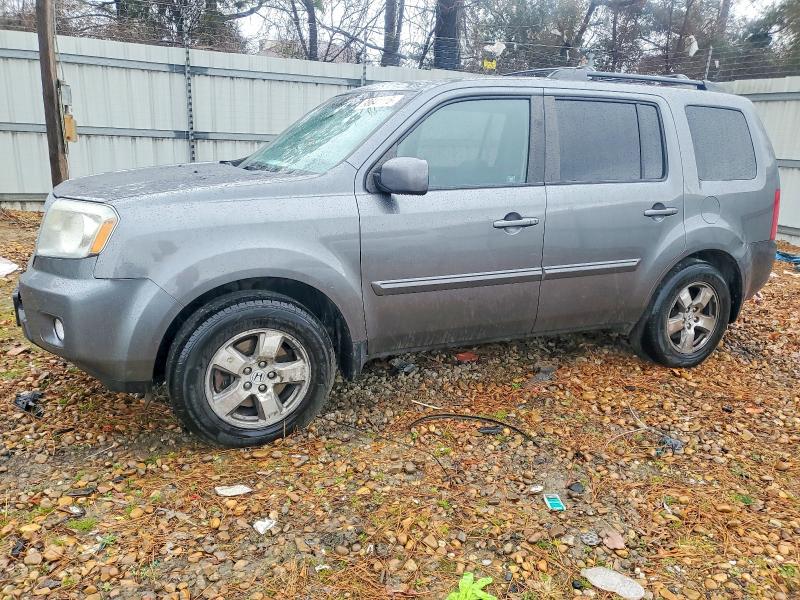 HONDA PILOT EXL 2011 with VIN 5FNYF4H59BB078242 - Photo from auction