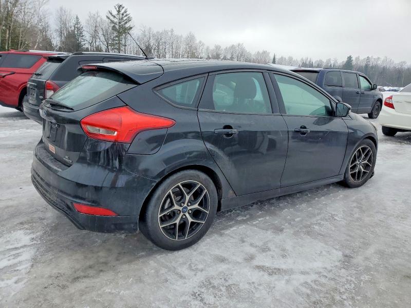 Photo 3 from auction – 2016 FORD FOCUS SE with VIN 1FADP3K28GL209854