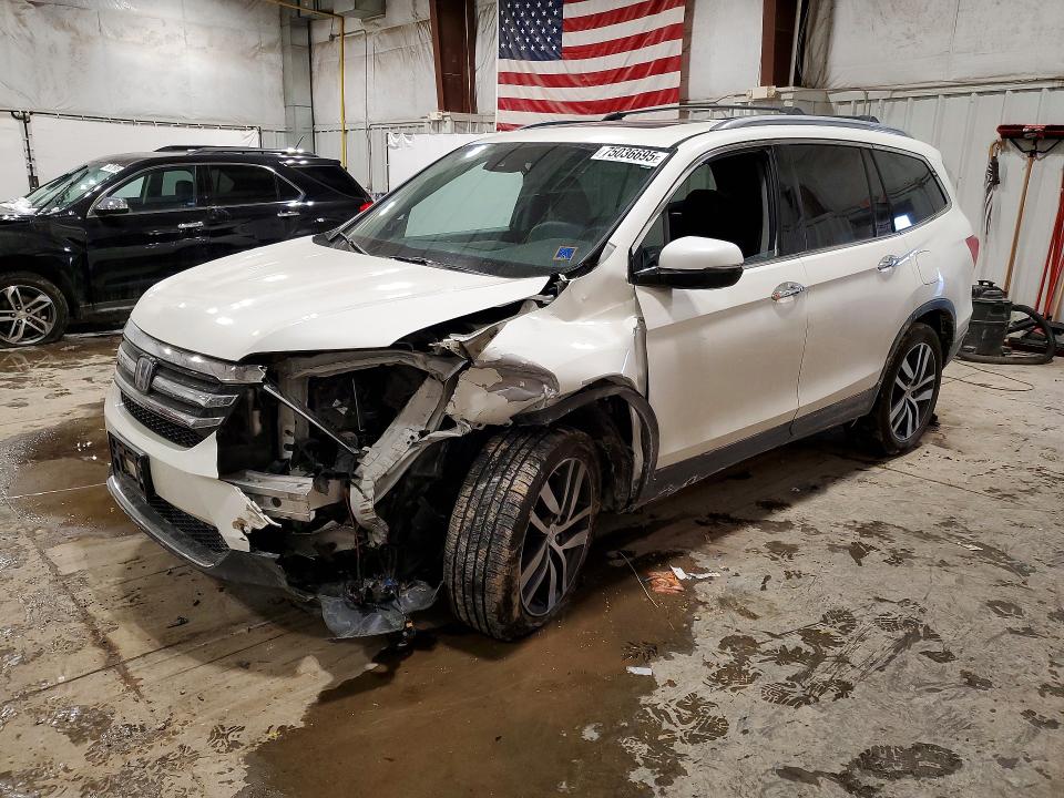 HONDA PILOT 2017 with VIN 5FNYF6H90HB074636 - Photo from auction