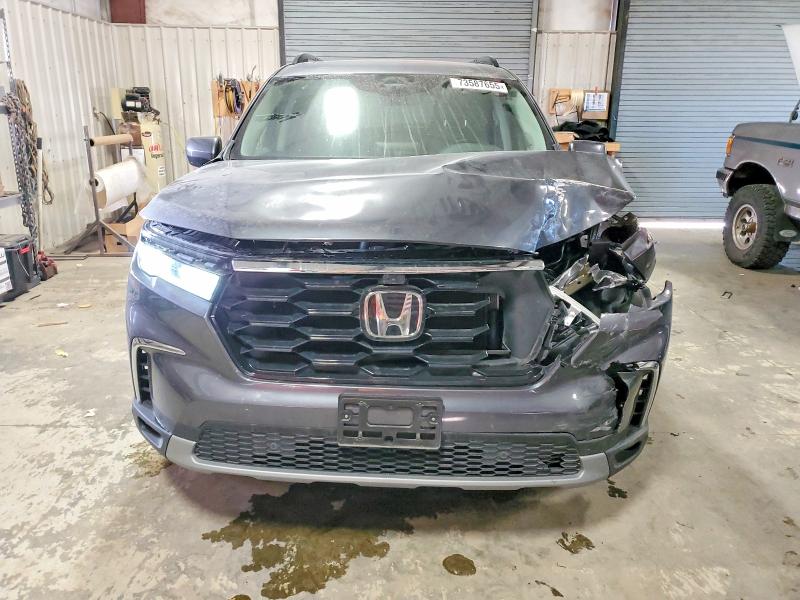 Photo 5 from auction – 2023 HONDA PILOT ELIT with VIN 5FNYG1H81PB035267