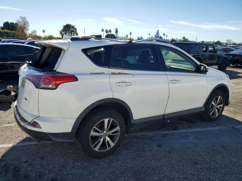 Photo 3 from auction – 2016 TOYOTA RAV4 XLE with VIN JTMWFREV1GJ087316