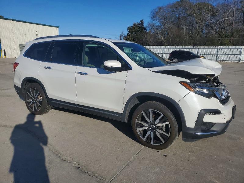 Photo 4 from auction – 2022 HONDA PILOT TOUR with VIN 5FNYF5H66NB004554